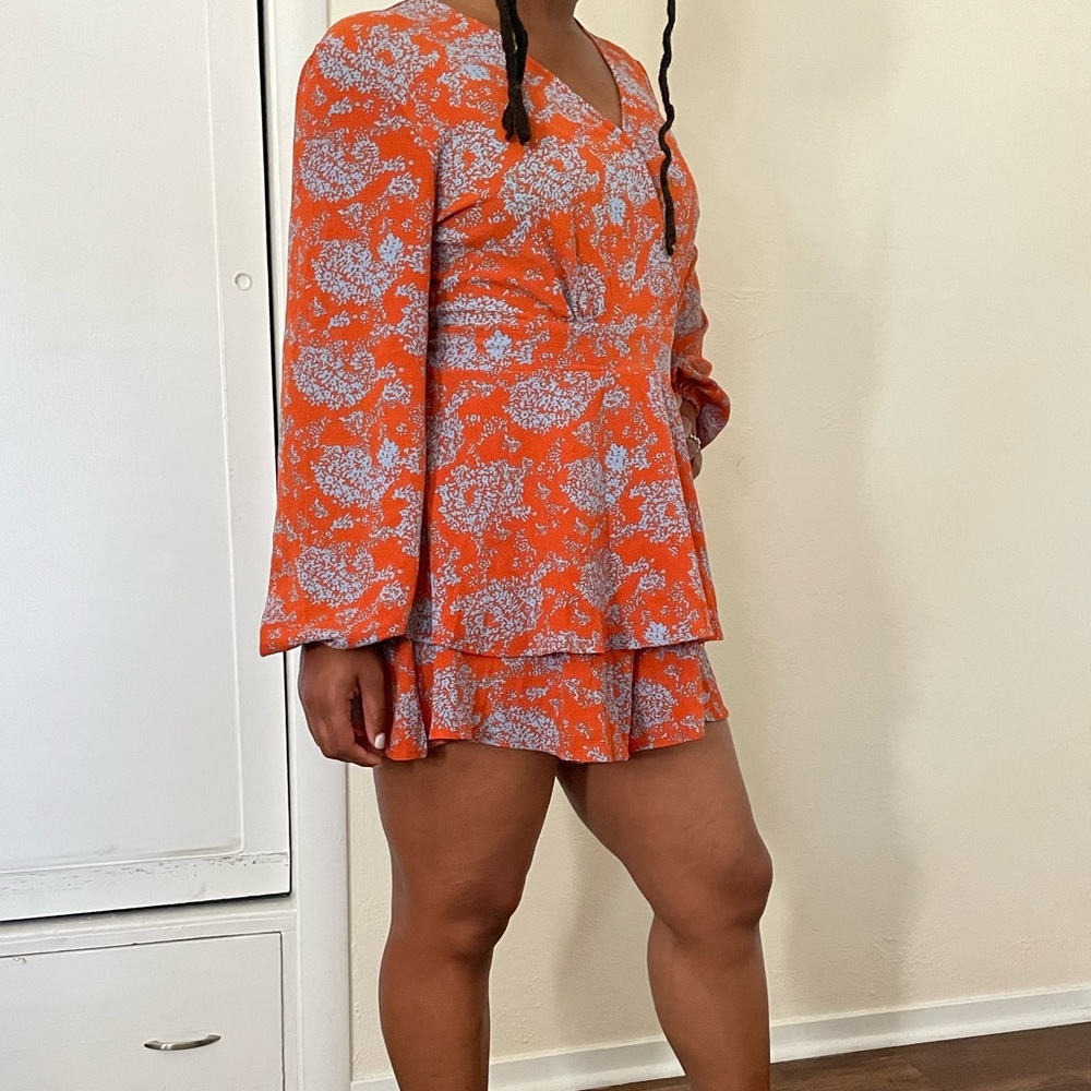 Floral orange romper size Large